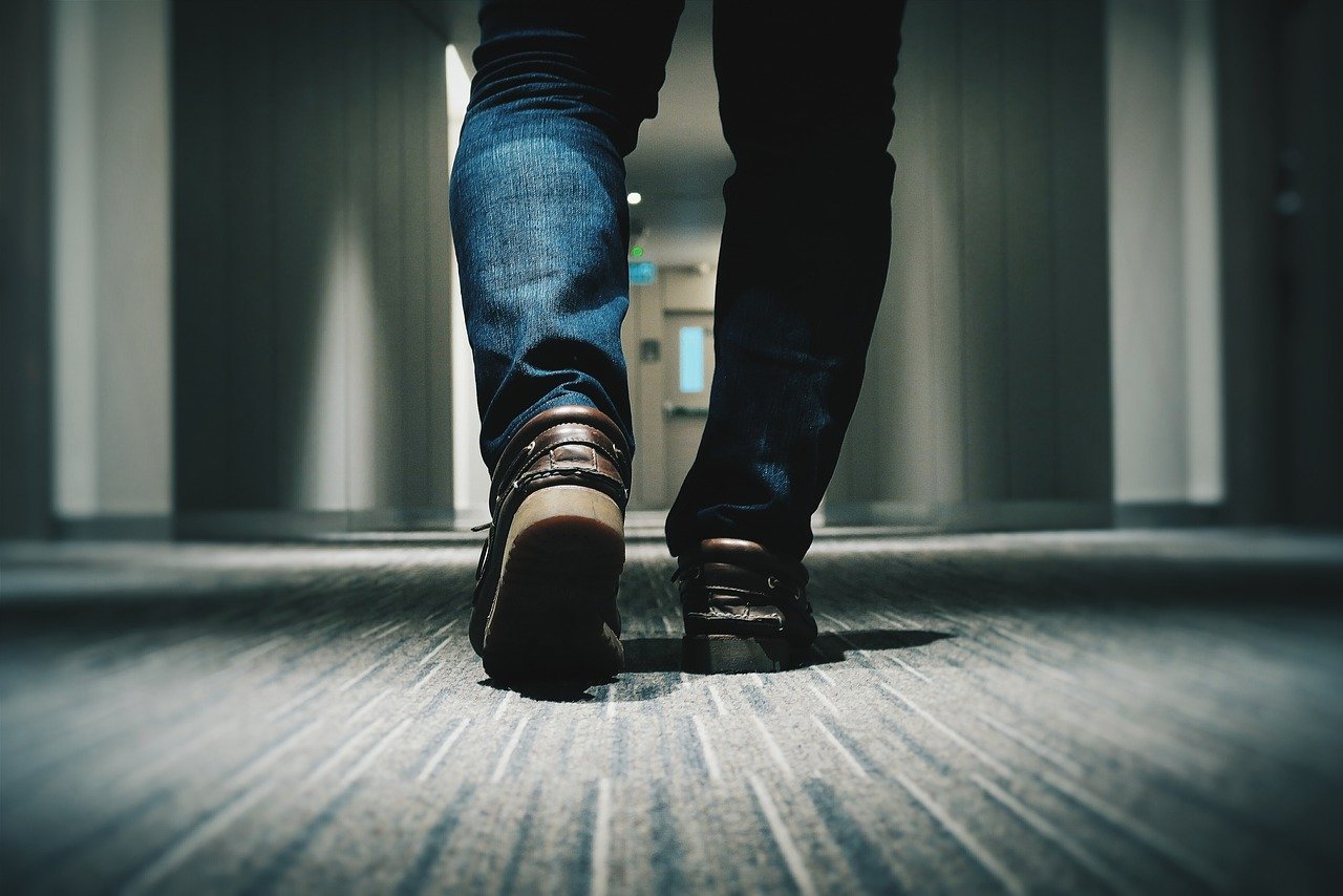 Man walking on floor