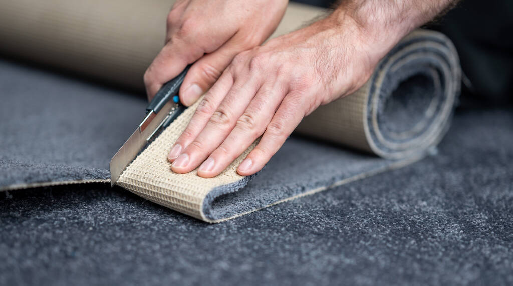 cutting a carpet